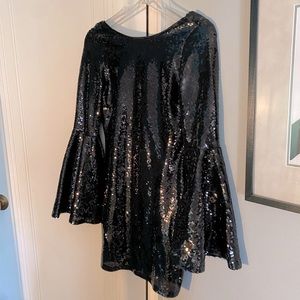 Women’s sequined mini dress with bell sleeves size S by Lulu.